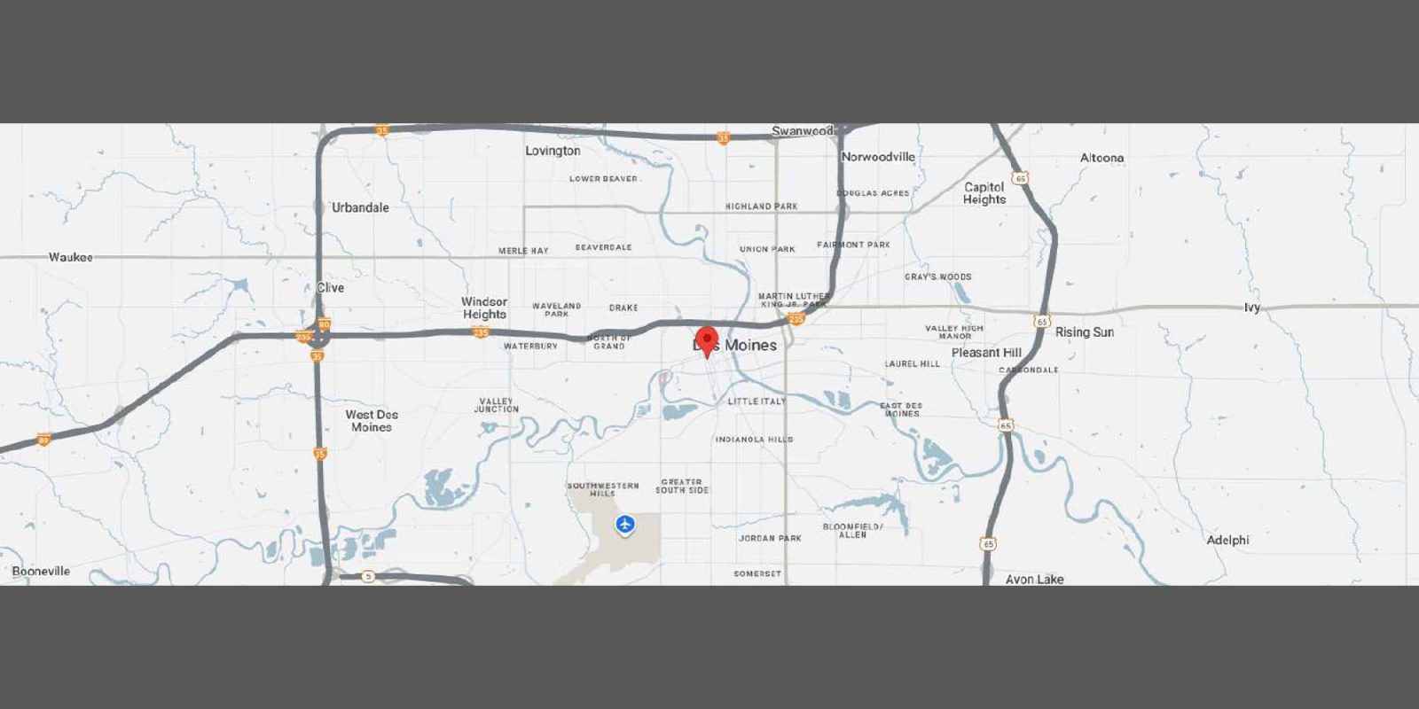 A map showing Des Moines, Iowa, and surrounding areas, with highways, roads, rivers, and nearby towns labeled. A red marker highlights the central location of Des Moines.