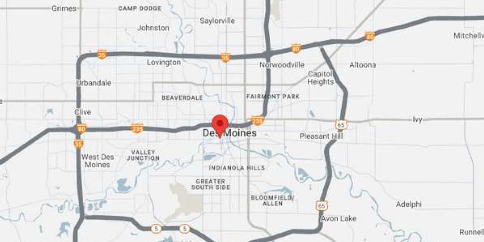 A map showing Des Moines, Iowa, with major highways, nearby neighborhoods, parks, and surrounding towns marked. A red location pin highlights the center of Des Moines.